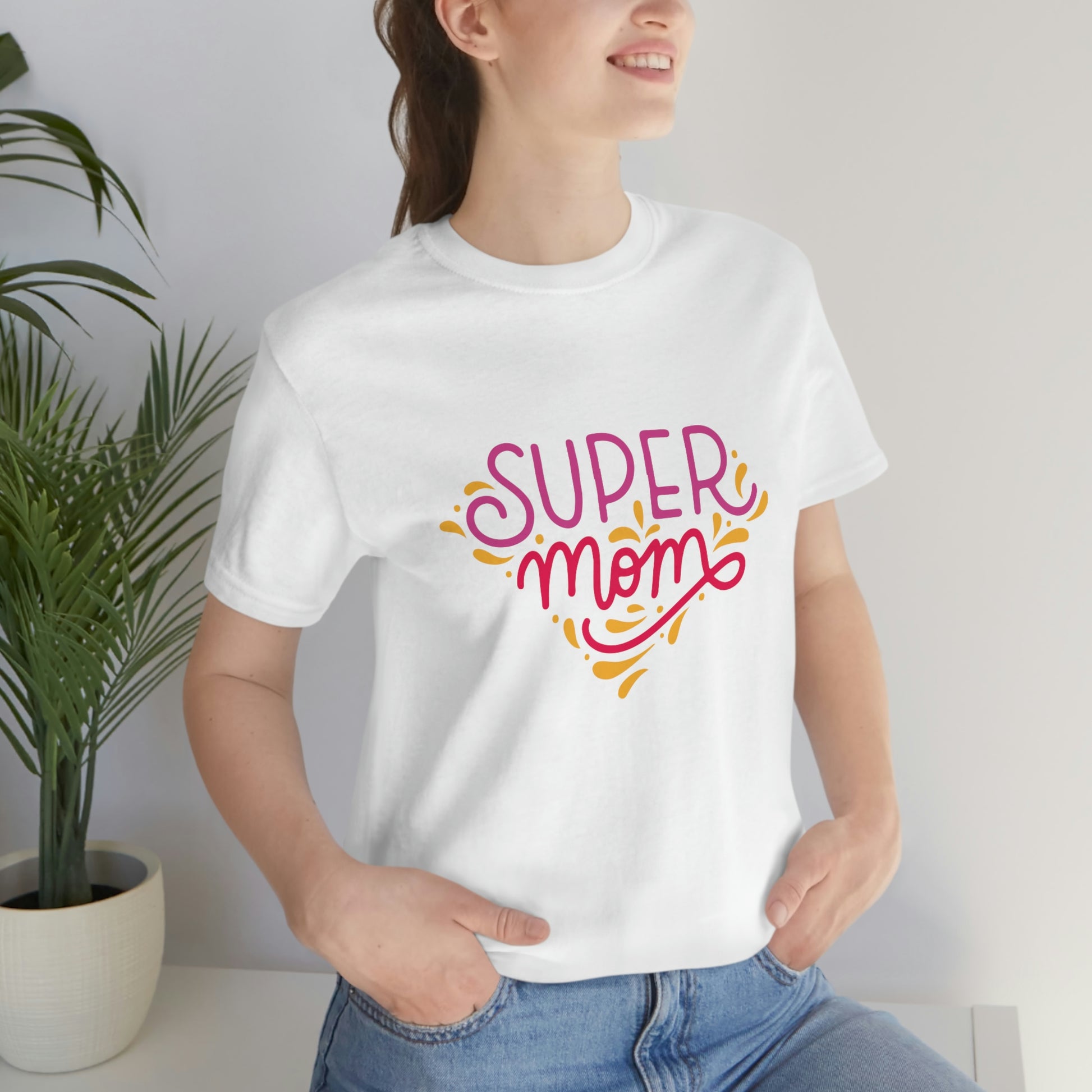 Super lovable design for the perfect Mothersday gift. Super mom white T-shirt is carefully crafted with high-quality materials, is both comfortable and durable, making it a versatile addition to any mom's wardrobe.