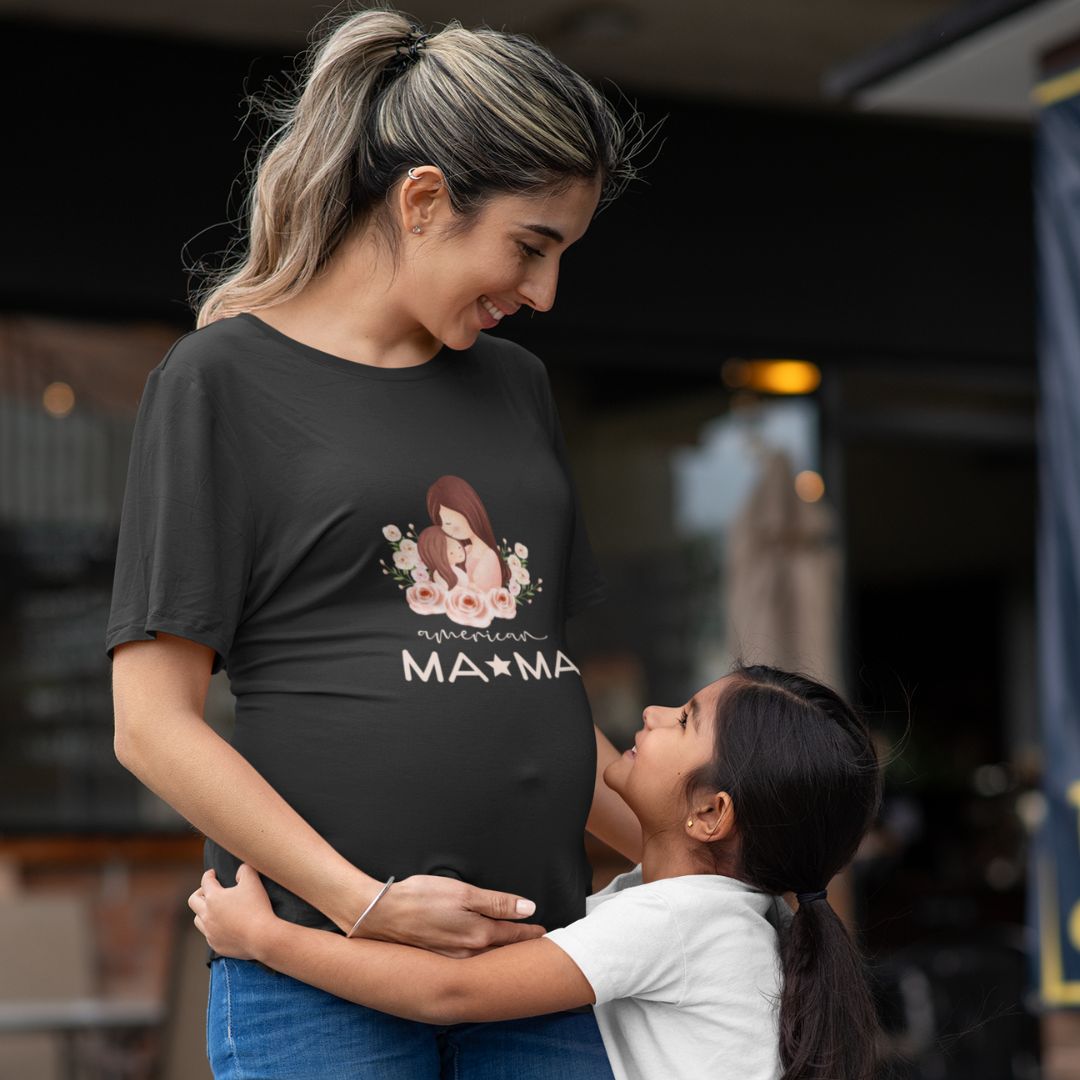 Get ready to make a statement with our American Mom black jersey short sleeve t-shirt. A perfect Mother's Day gift for any mom. Celebrate her with this unique and stylish t-shirt.