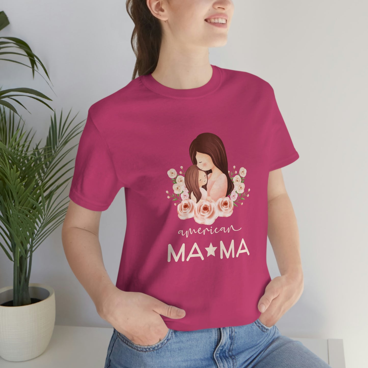 Get ready to make a statement with our American Mom berry colored jersey short sleeve t-shirt. A perfect Mother's Day gift for any mom. Celebrate her with this unique and stylish t-shirt.